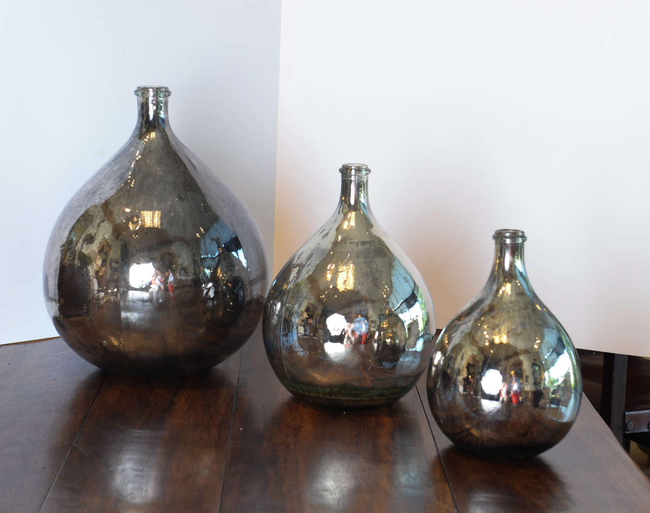 Collection of Mercury Glass Calvados Bottles 1
