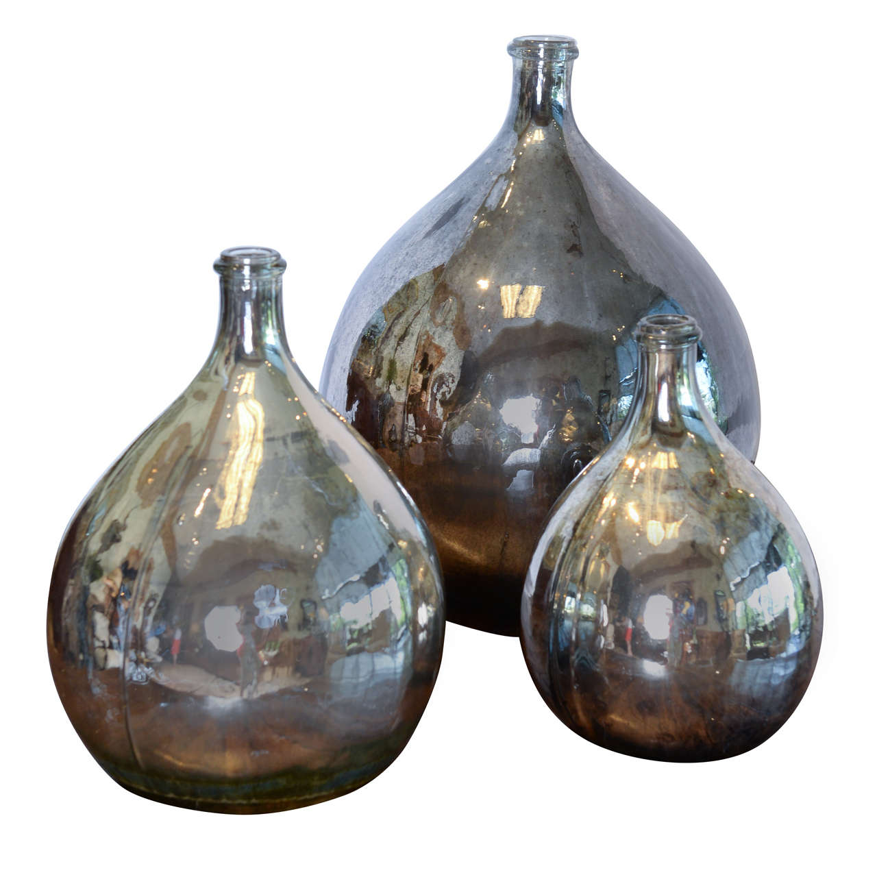 Collection of Mercury Glass Calvados Bottles