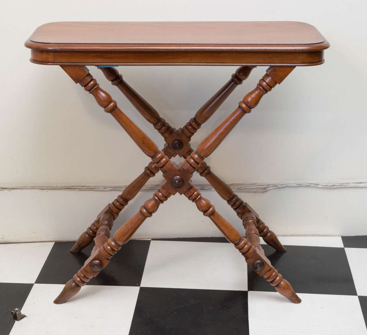 19th c. English Walnut campaign style server of excellent proportions. Solid boards and turning with sturdy fixed legs and crossed stretcher base. Very good antique surface.