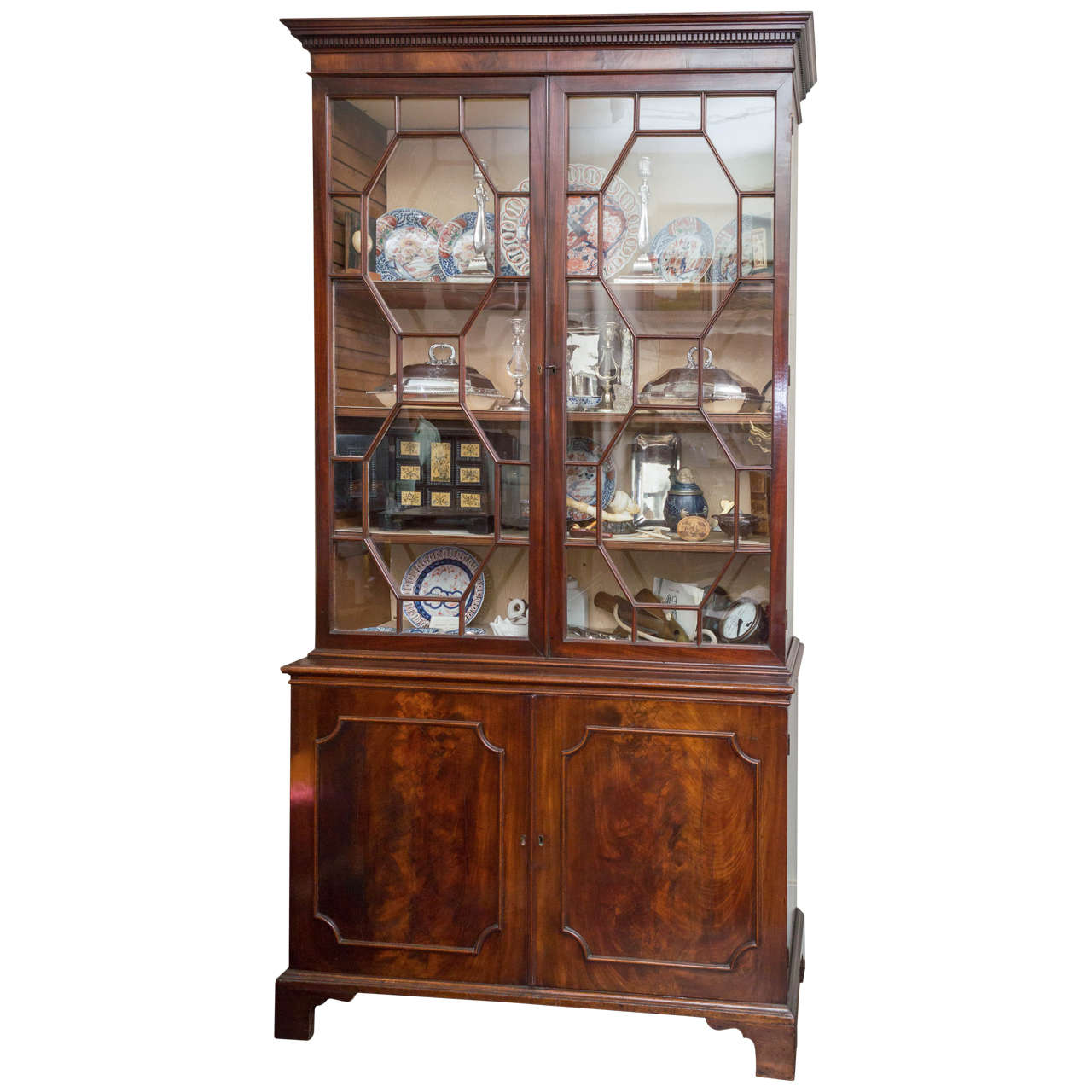 Early 19th Century English George III Figured Mahogany Bookcase For Sale