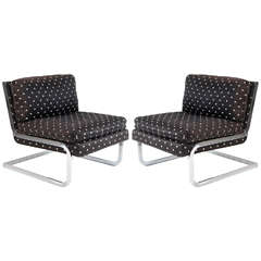 pair of chrome slipper chairs by Pace Collection