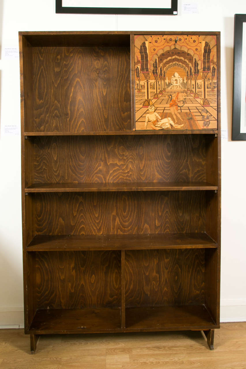 The famous architect Otto Prutscher (1880-1949) designed this tainted wood bookcase in the 1920s in Vienna (Austria) for the cabinetmaker August Knobloch. The design of the bookcase is very simple and is enhanced by the top right door decorated with