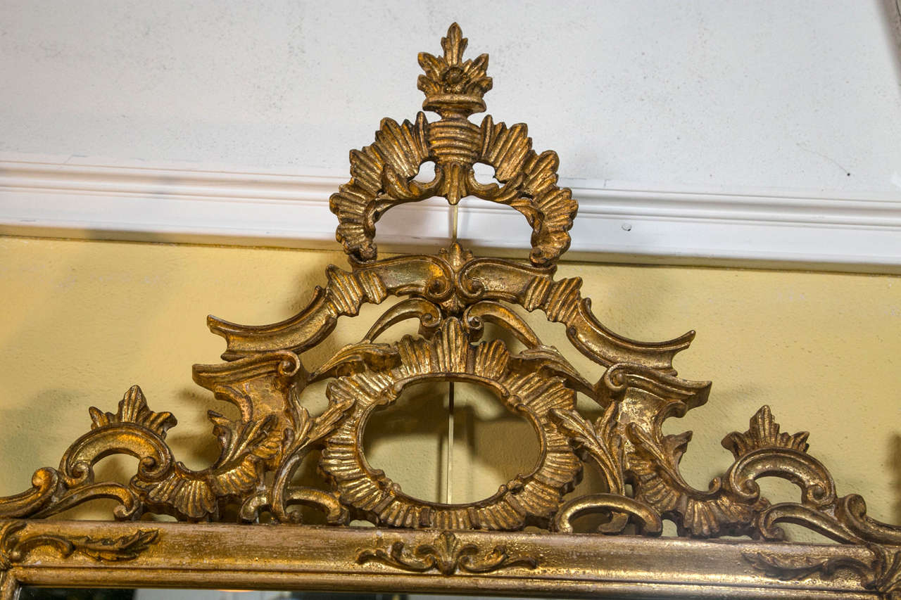 18th Century Pair of Rococo Carved and Giltwood Mirrors