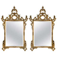 Pair of Rococo Carved and Giltwood Mirrors