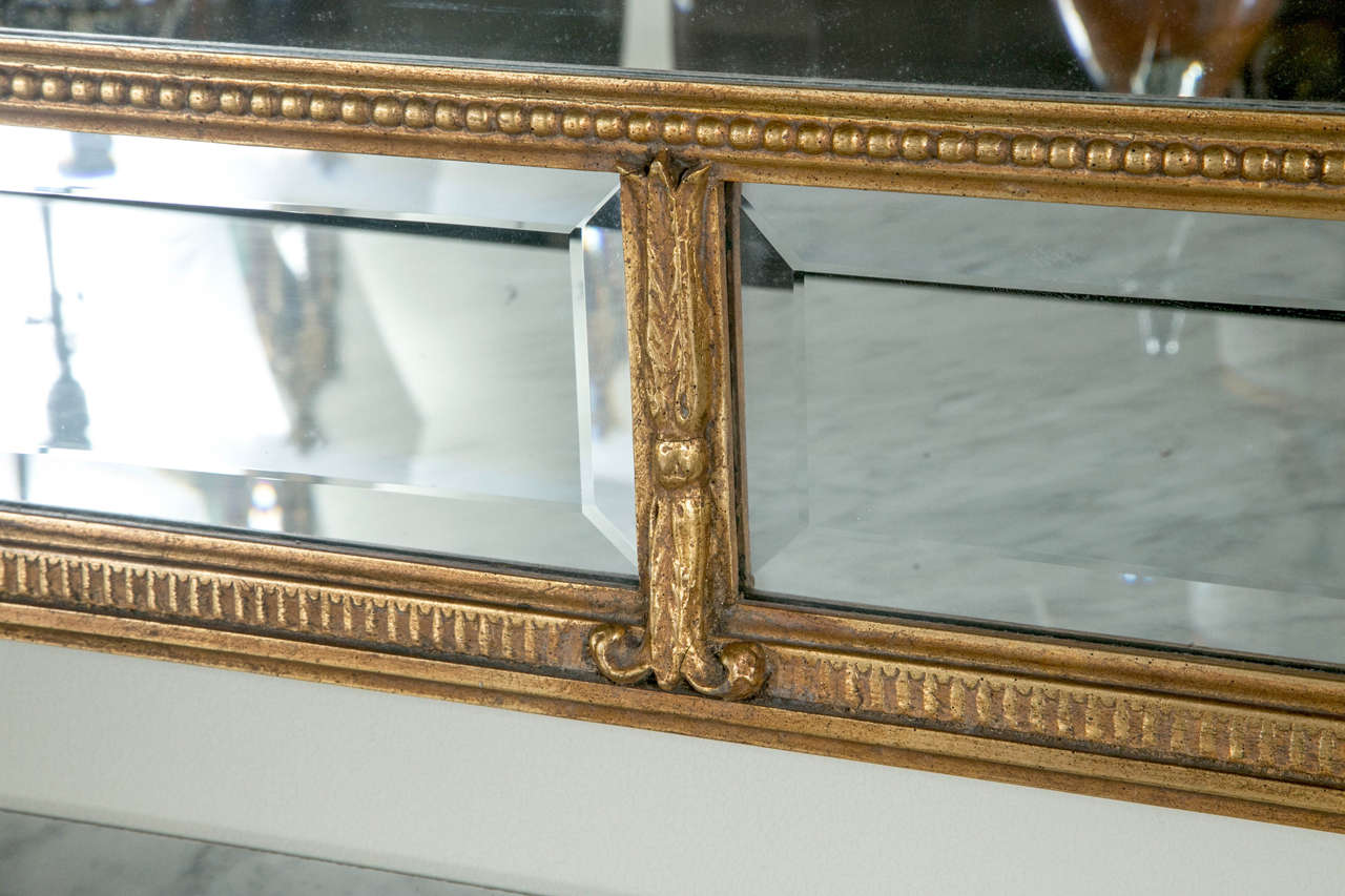 19th Century Pair of Monumental Louis XVI Style Giltwood Mirrors