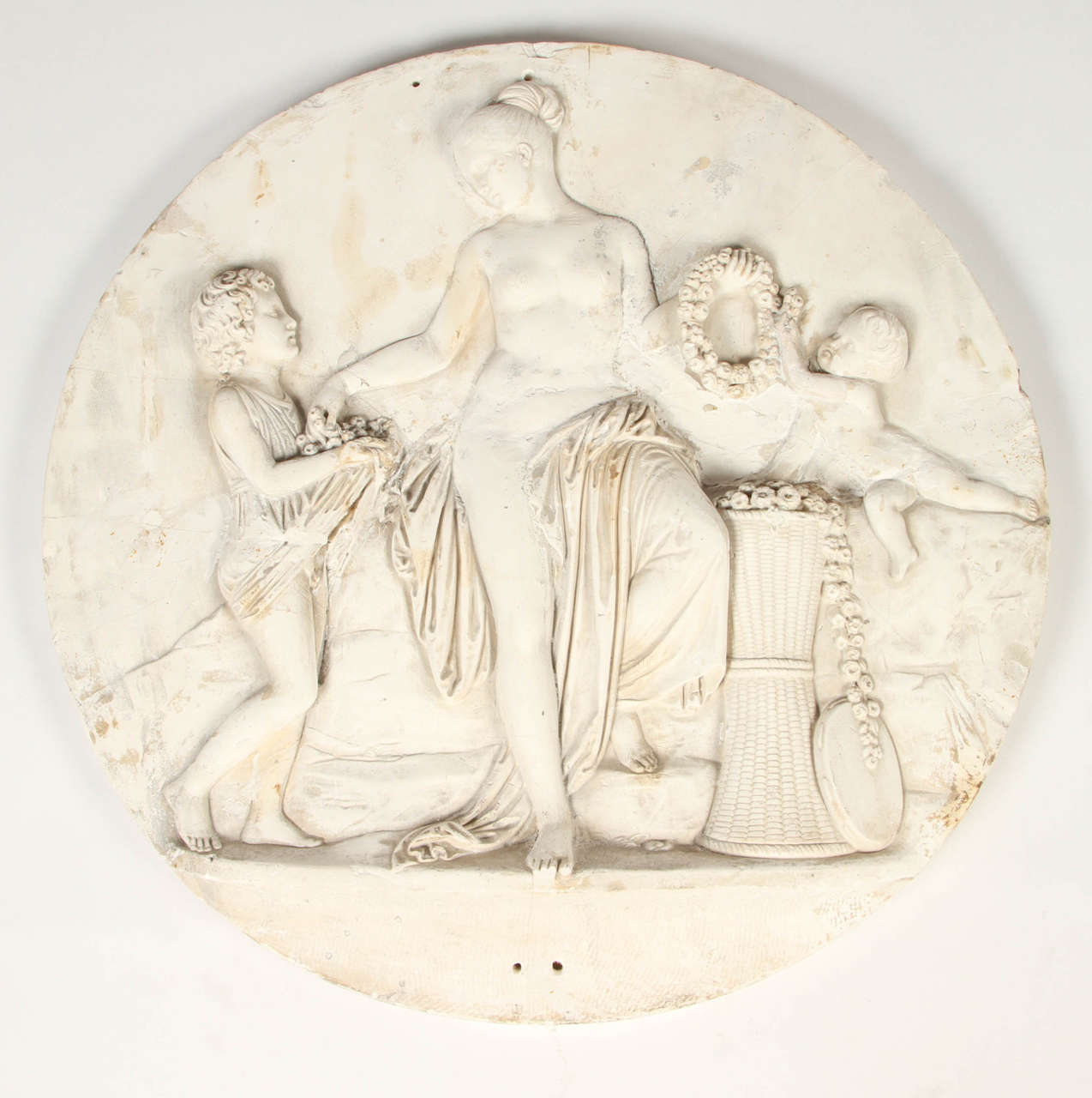 Each of these plaster roundels depict one of the four seasons in the neoclassical style that Bertel Thorvaldsen was famous for. This collection is one of the larger scaled sets issued from the Thorvaldsen Museum in Copenhagen, Denmark. Romantic and