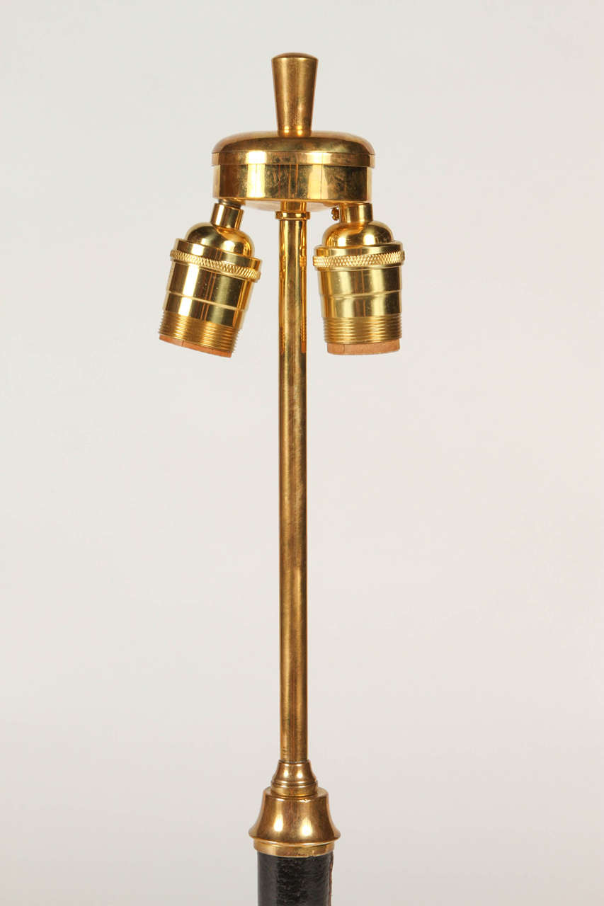 French Pair of Jacques Adnet Lamps in Brass and Leather