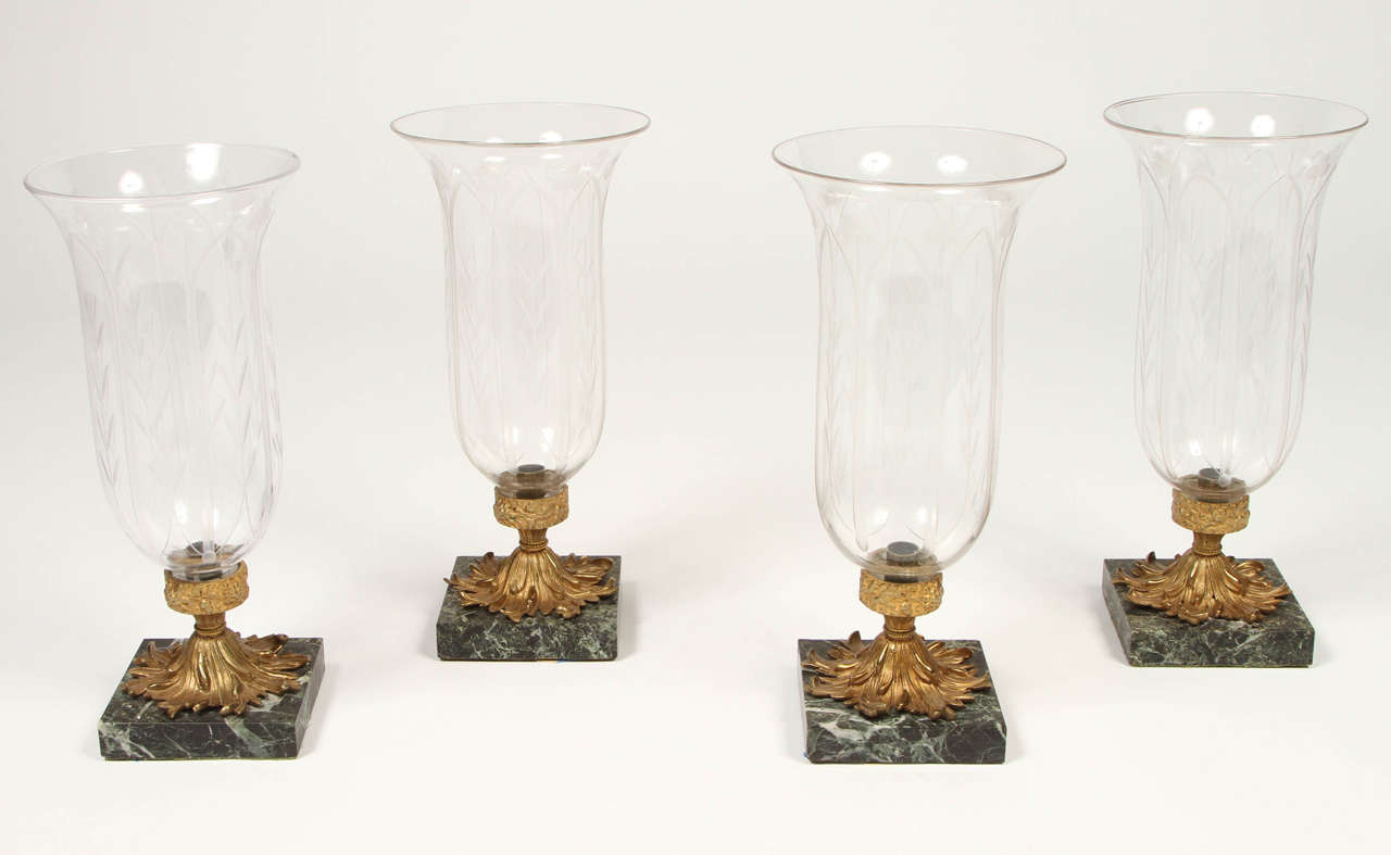Set of Four Hurricanes with Gilt-Bronze and Marble Bases