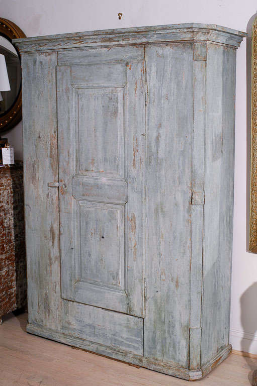 A light blue painted Alsatian country cupboard, great for storage. Two drawers, three shelves and pegs.
