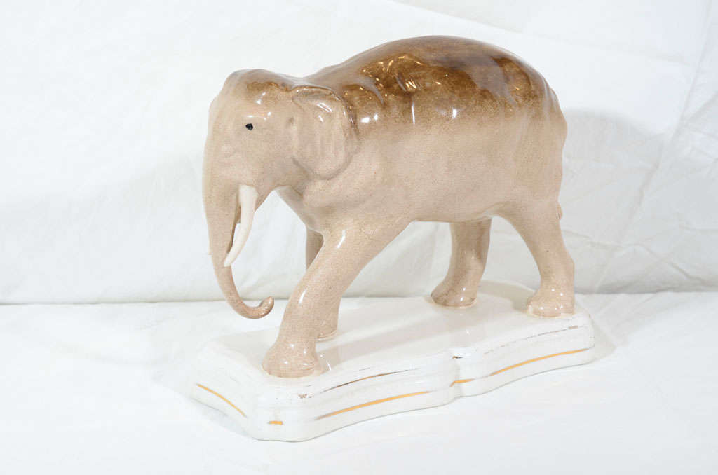 A Staffordshire figure of Jumbo the elephant. Born in Africa, Jumbo arrived at the London Zoo in 1865 where he became famous for giving rides to children. In 1882 Jumbo was sold to P. T. Barnum, owner of the Barnum & Bailey Circus, known as 