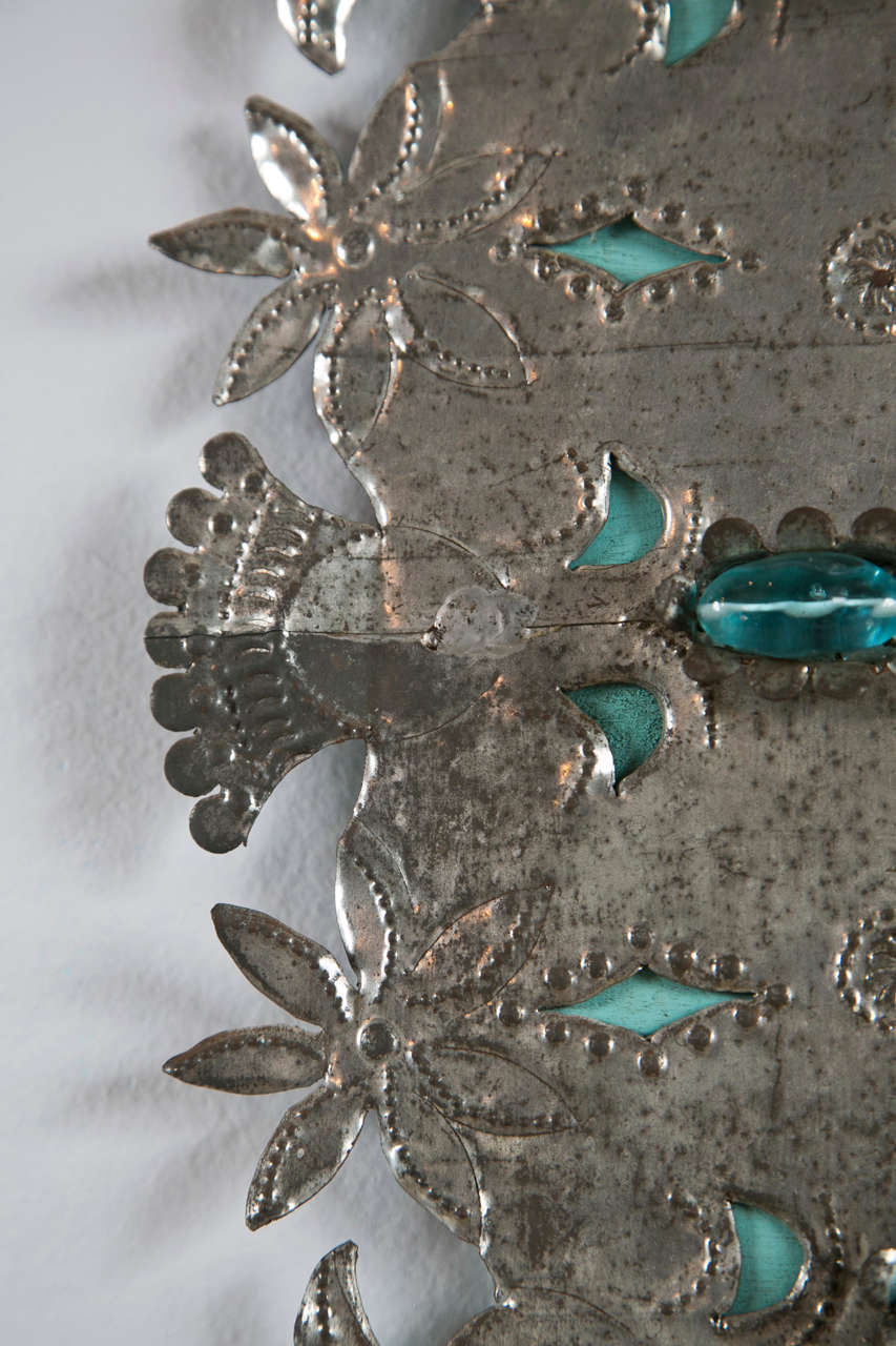 Pair of Mexican tin oval mirrors, c.1950s. In Good Condition In Stamford, CT