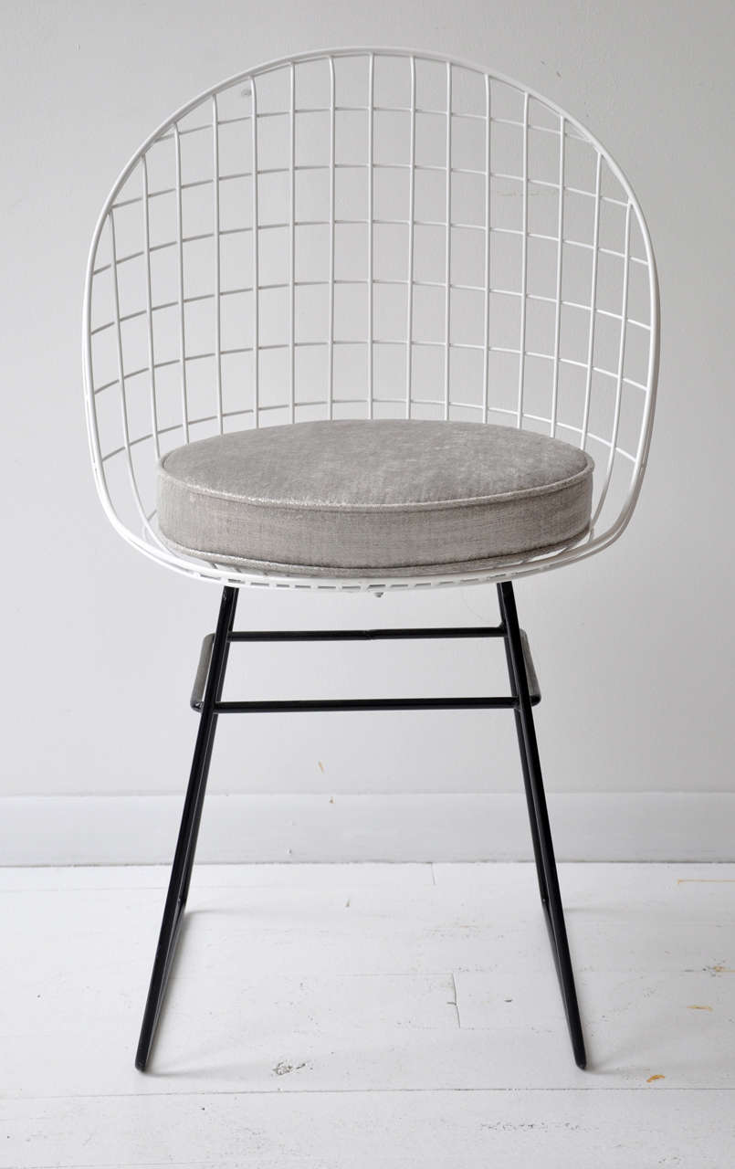 A hard to find set of eight wire dining chairs by Cees Braakman for Pastoe. 

The set consists of two different models (two ''armchairs'' & six armless chairs). The chairs have recently been powder coated in black and white and they where used as