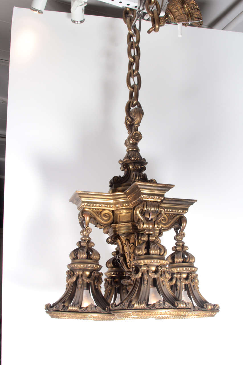 This solid bronze chandelier once graced the Senate Antechamber in the Pennsylvania state Capitol in Harrisburg. The casting quality is superb. Large-scale drop and heavy. This can be seen at our 5 East 16th St. store at Union Square in Manhattan.