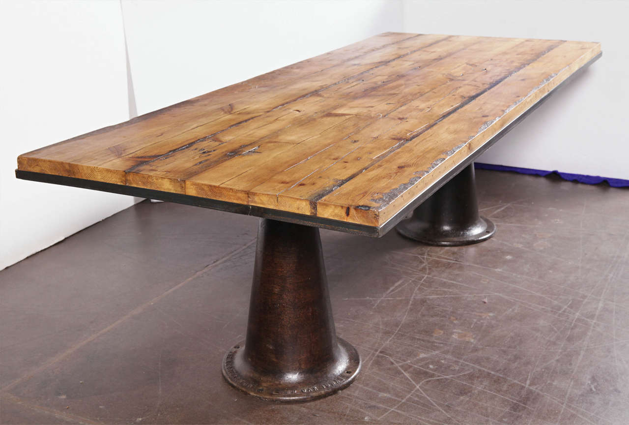 Double pedestal dining table, industrial supports with reclaimed French pine top.