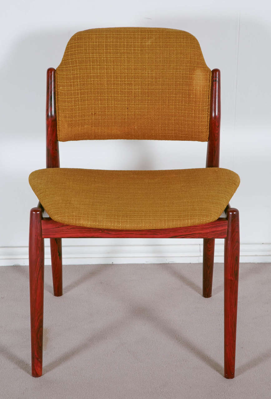 Set of six rosewood chairs with original wool fabric.