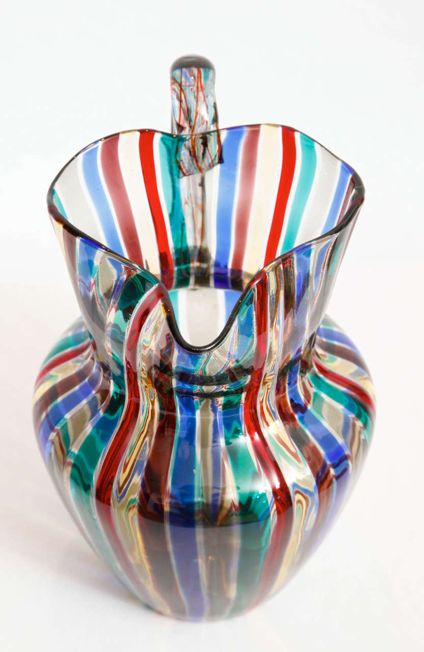 Glass pitcher, so-called 'Seven colors,' with fused colored glass canes ('a canne') designed by the Italian architect Gio Ponti (1891-1979) and executed by Venini, Murano (I).
