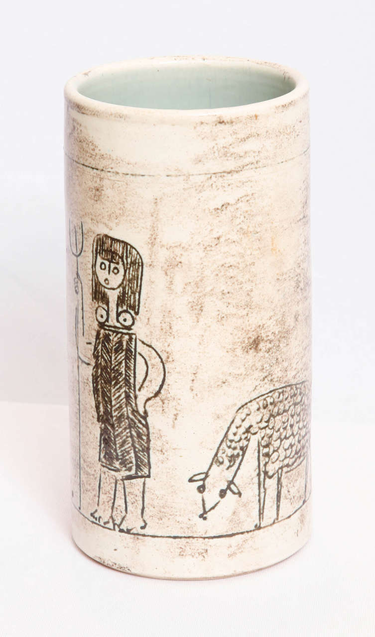 Cylindrical ceramic vase executed by the French ceramist Jacques Blin (1920-1995). Hand thrown glazed ceramic with an engraved decor.