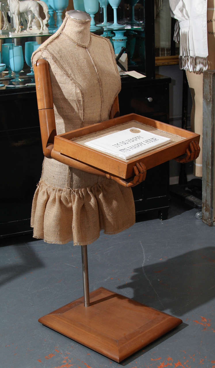 Vintage mannequin in dress and tray covered in burlap.
Fun to great your guests with message in her tray or to display jewelry or shoes etc at home or in a retail setting.