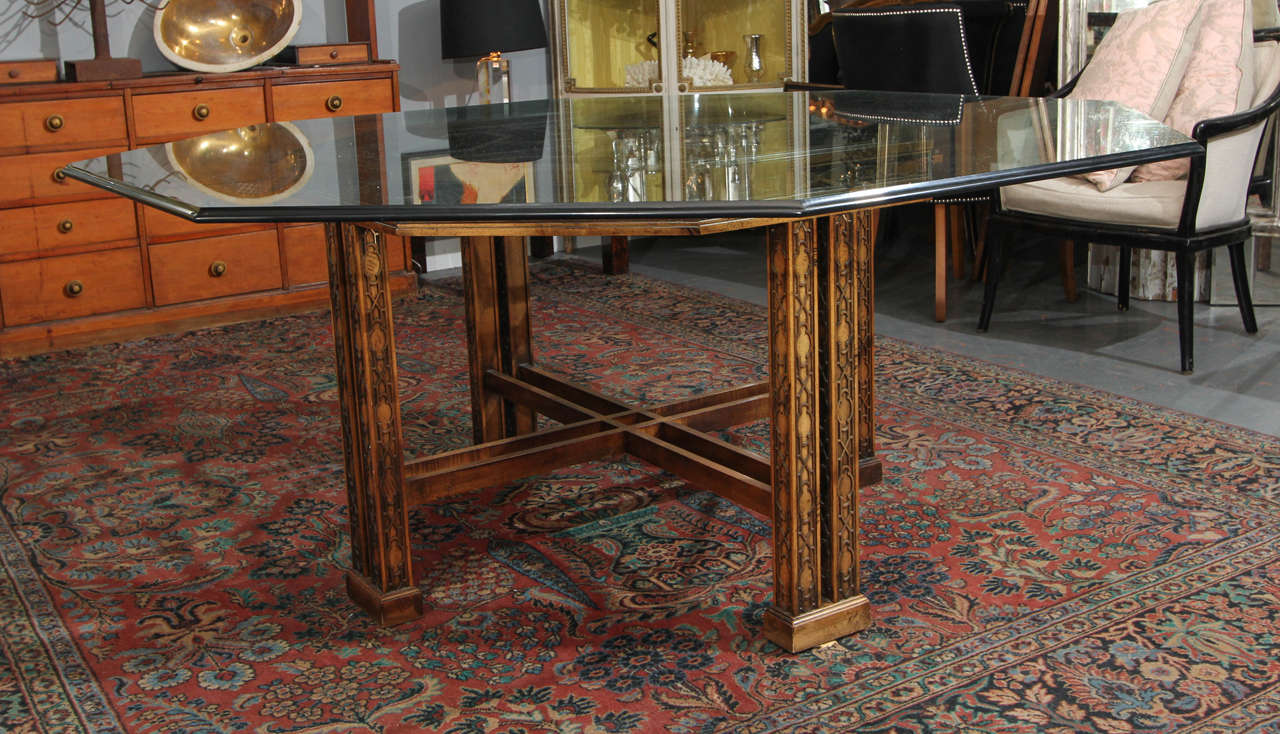 Vintage Maguire wood base table with heavy bevel 3/4 in glass top. This table is very roomy in feel because of the generous octagonal top.