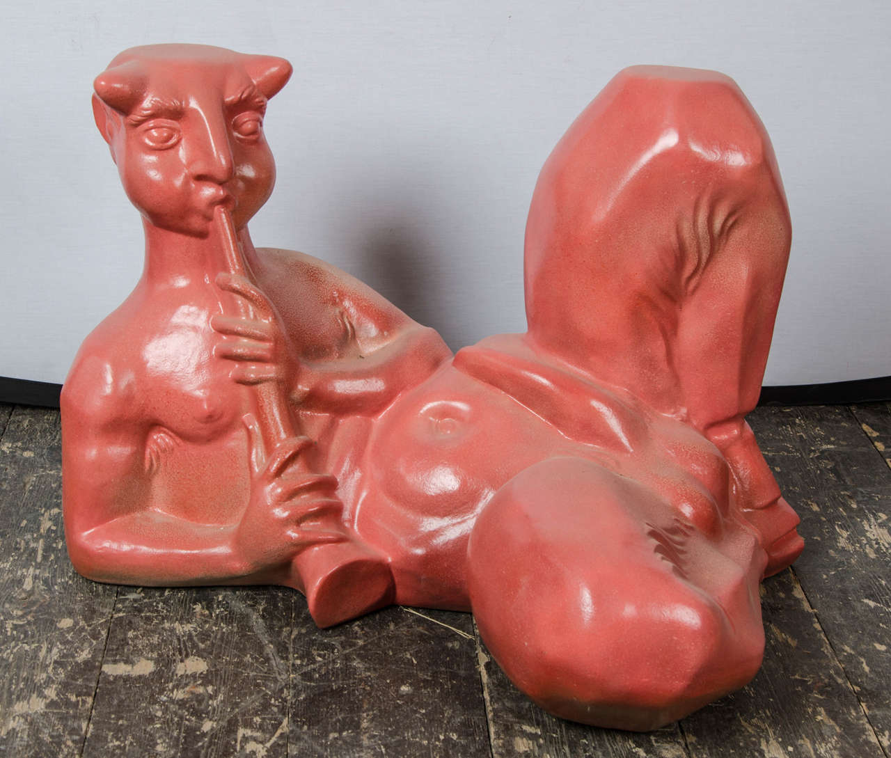 Very rare and unusual sculpture of life size faun playing flute, in red glazed ceramic Italian 50's