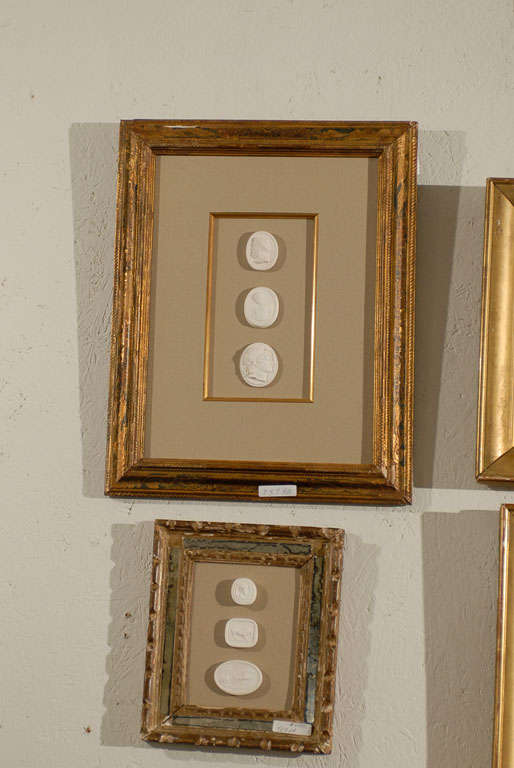 Set of Antique Frames of Variouse Sizes with reproduction intaglios. Prices vary. Each priced seperatly and can be sold individually.$620 price for center bottom frame.