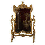 Carved cheval mirror