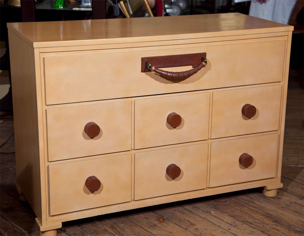 Early  Russel Wright design for Conant Ball- Lacquered in a creamy 
Custard color- Three drawers with unique brown leather handles