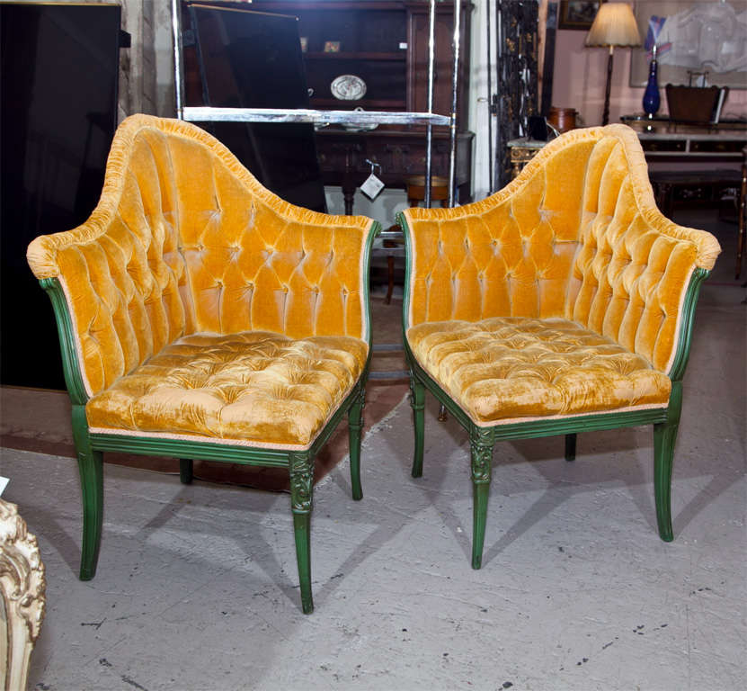 Corner armchair, green painted wood frame with tufted yellow velvet upholstery and rolled arms.