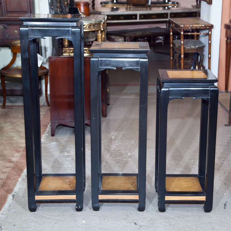 Set of 3 decorative Oriental style ebonized plant stands or pedestals with wood tops.

Tall - H-42, L-11.50, 11.50
Medium - H-36, L-12, W-12
Small - H-25.50, L-11.50, D-11.50