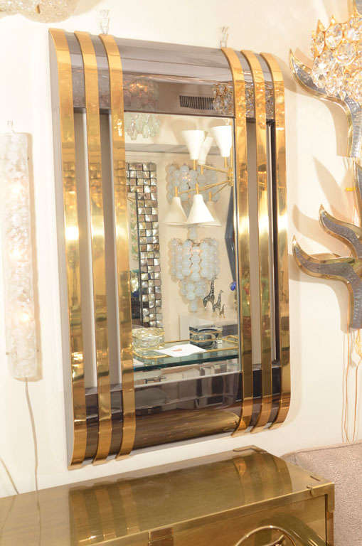 Rectangular mirror with brass and gun metal surround by Karl Springer. Signed.

View our complete collection at www.johnsalibello.com