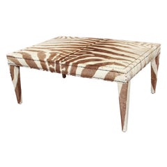 custom coffee/cocktail table upholstered in vintage zebra hide