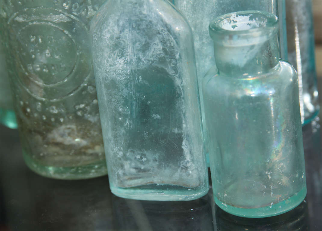 Group of Seven Aqua Bottles 1