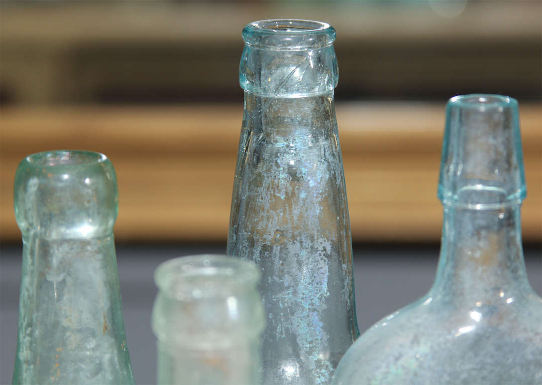 Group of Seven Aqua Bottles 4