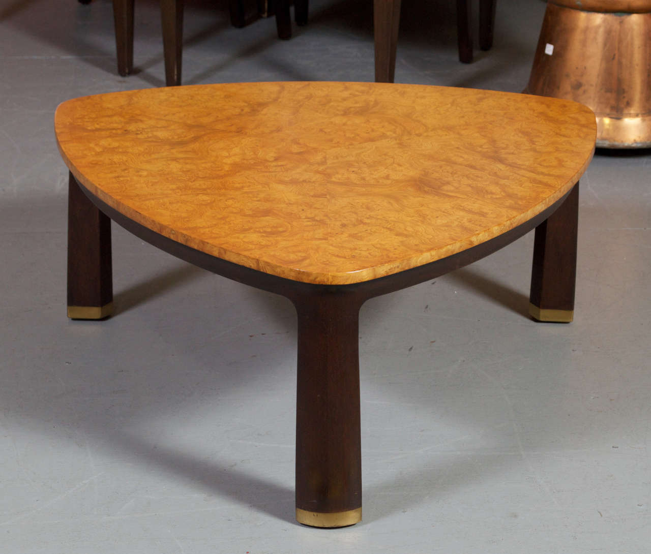 For your consideration is this versatile triangular table designed by Edward Wormley for Dunbar.  This 1950's/ 60's table has the presence and scale of a coffee table but can also be utilized as a occasional table.

***Located at our Lombard St
