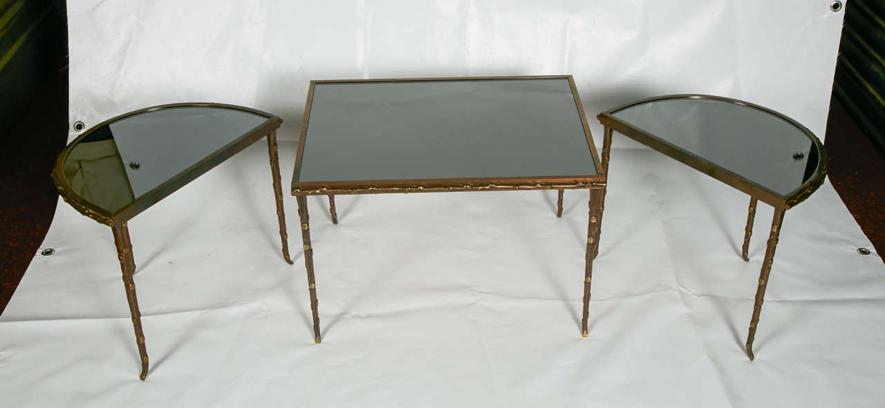 1960's Coffee Table in three shares in Bronze Patine.
the central part measuring 60cm in width