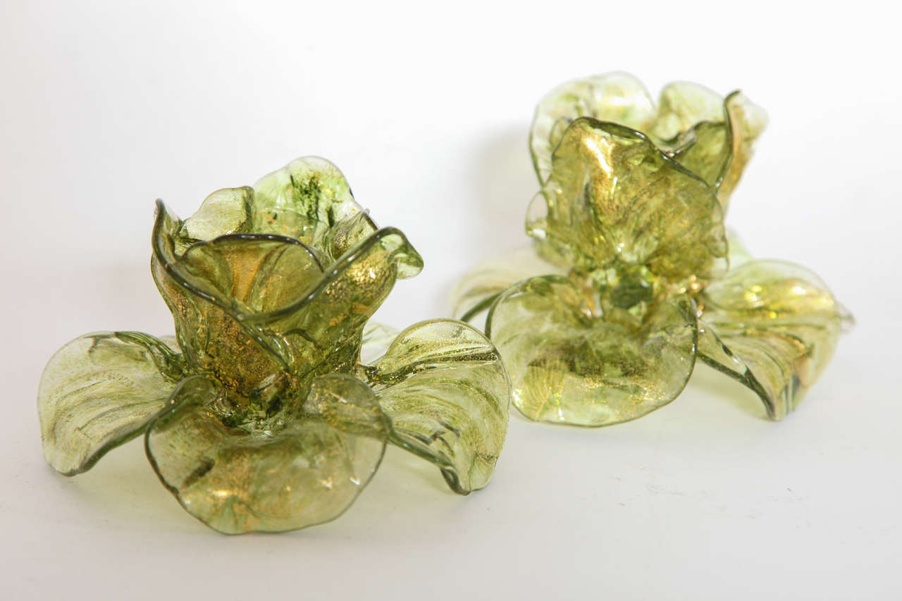 A wonderful pair of floral candleholders in Murano glass.