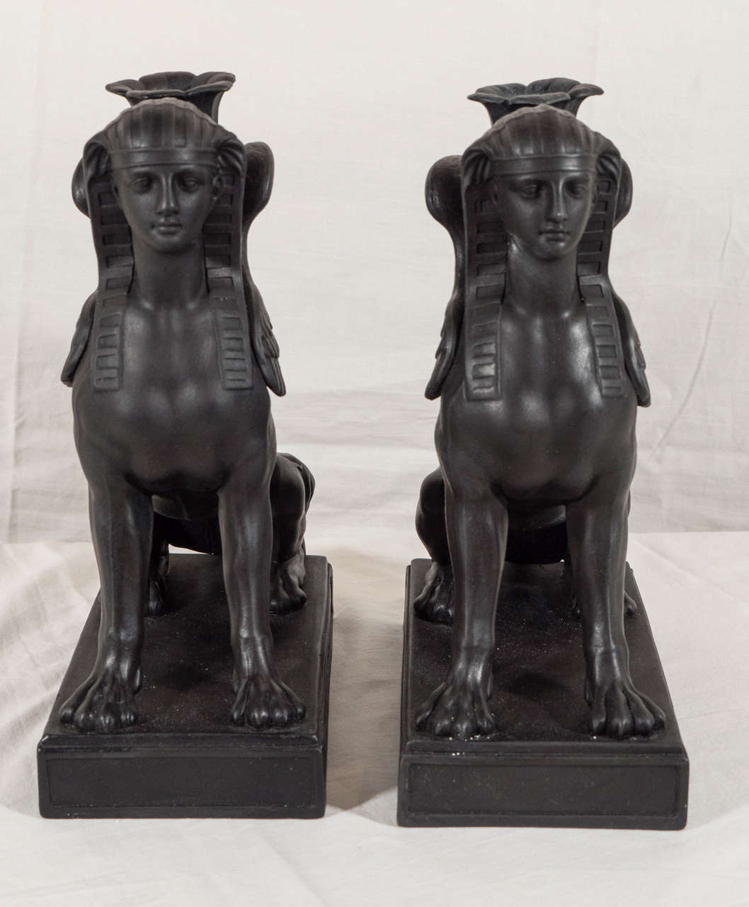 English Pair of Wedgwood Black Basalt Candlesticks Modeled as Sphinxes