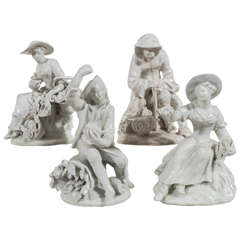 Set of Four 18th Century English Porcelain Bow Figures of the "Rustic Seasons"