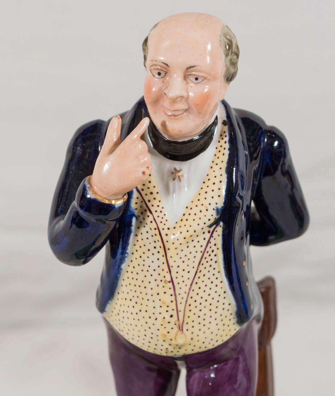 We are pleased to offer this amusing pair of 19th century Staffordshire figures of the Dickens' characters Mr. Pickwick and Sam Weller of the very popular Pickwick Papers. The figures were made by Dudson Pottery, circa 1840. The  figures are well