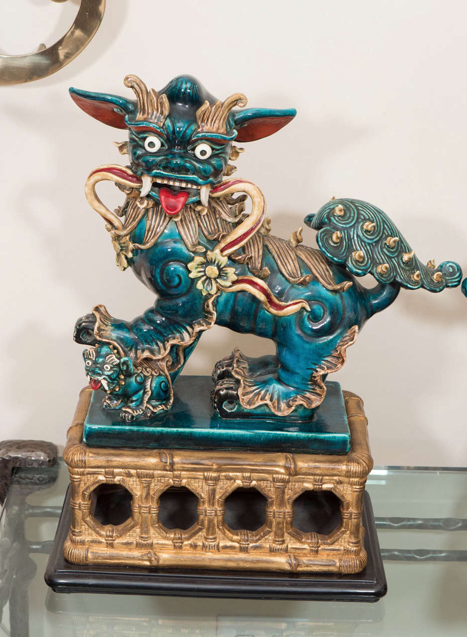 Chinoiserie Pair of majolica dragon sculptures