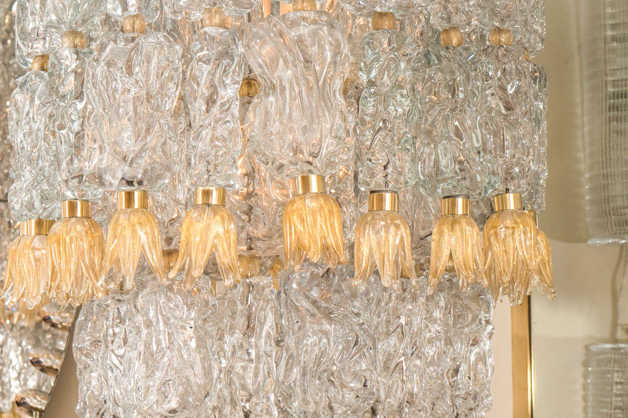 Italian Tiered chandeliers composed of textured glass elements