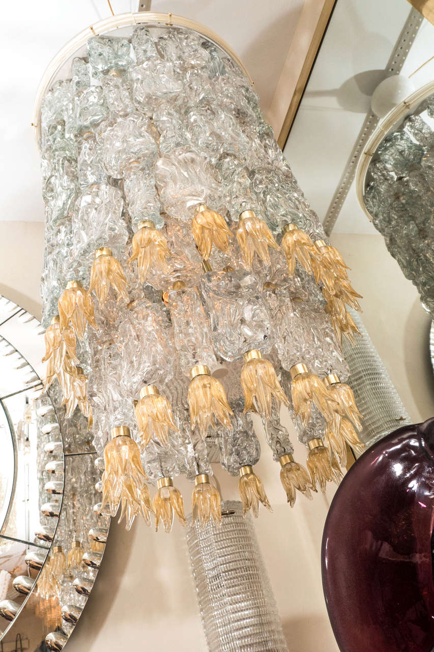 Late 20th Century Tiered chandeliers composed of textured glass elements