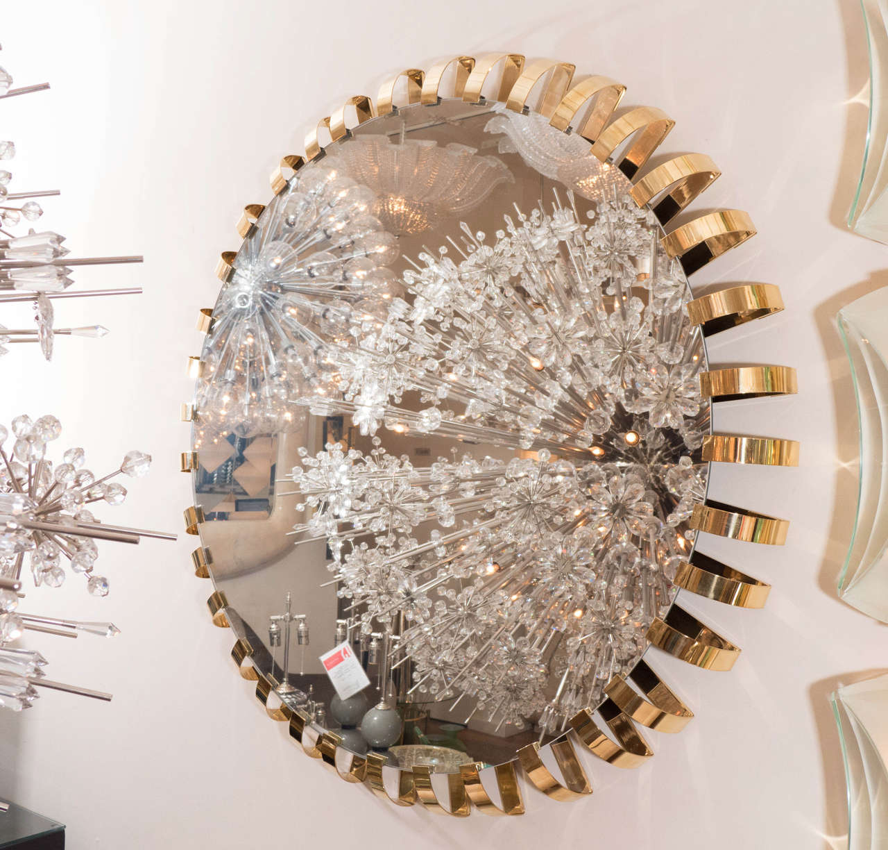 Monumental mirror with brass loop surround