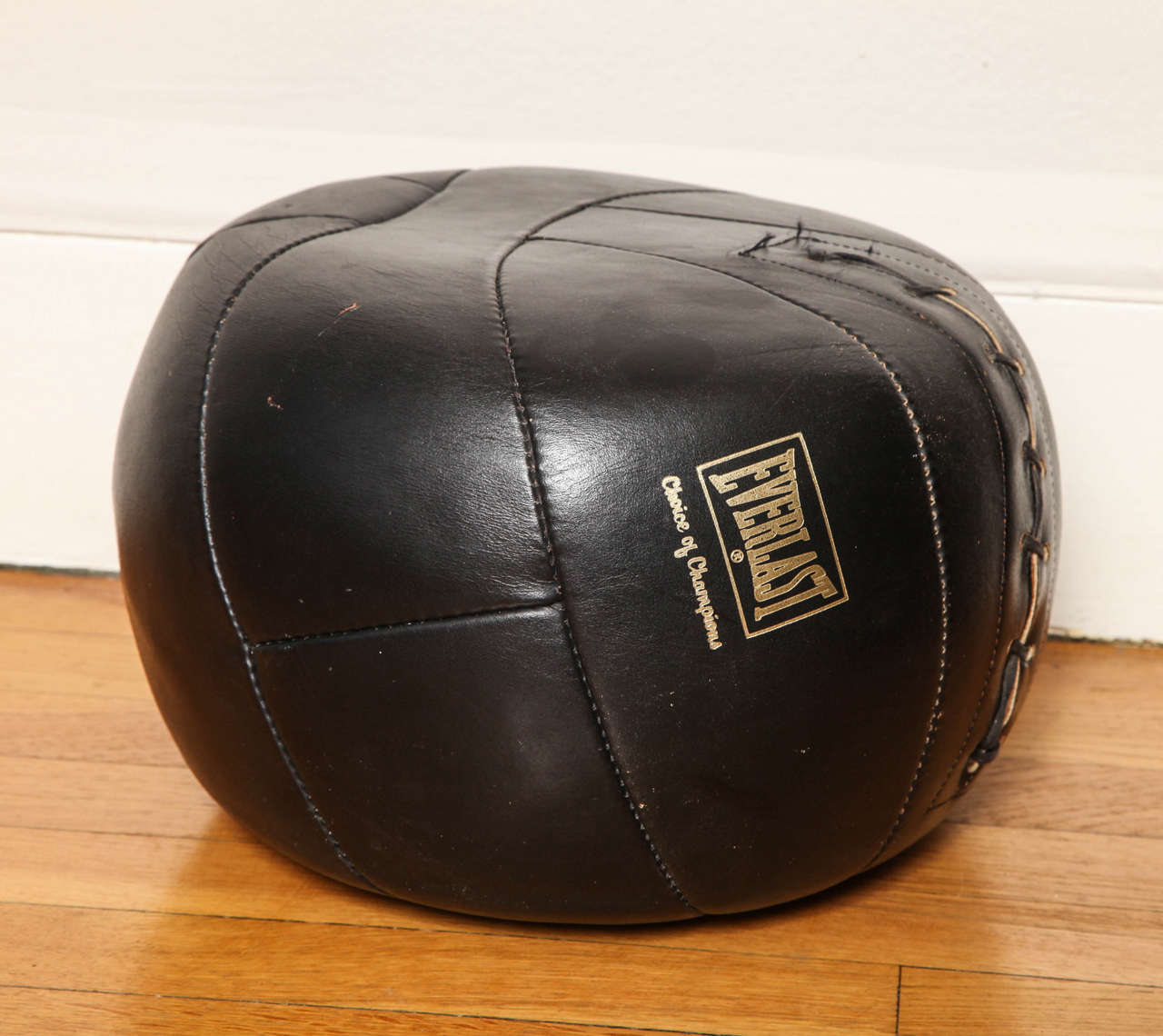 Handsome vintage 1950s black leather medicine ball by Everlast.