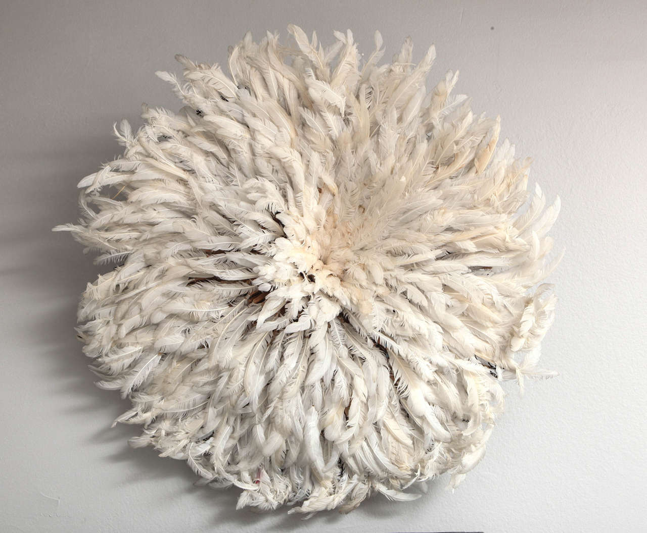 Decorative African feather headdress in white -- JuJu Hat. Cameroon, in the style of the Bamu Tribe.