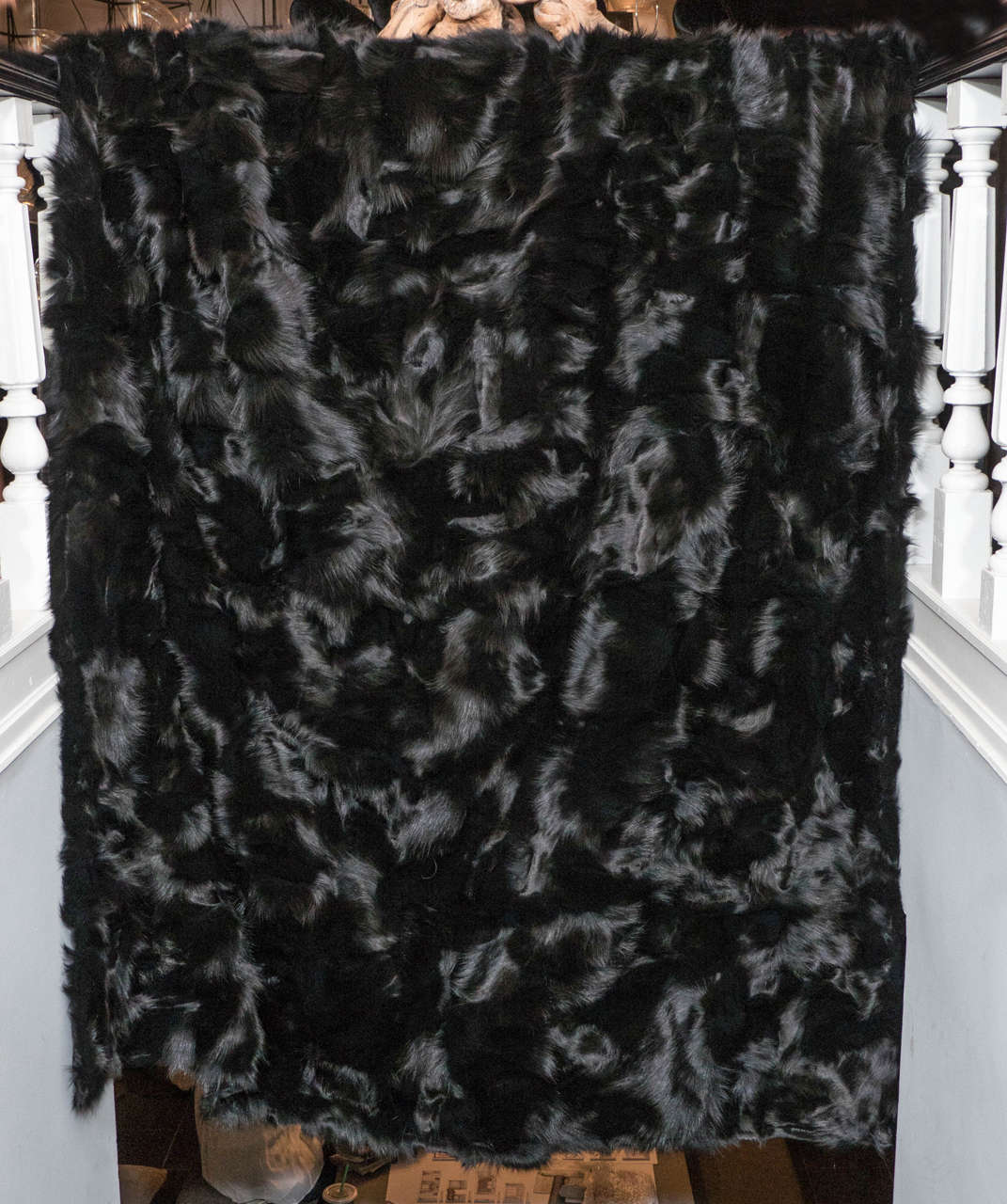 Custom-made black fox blanket with black quilted satin lining.