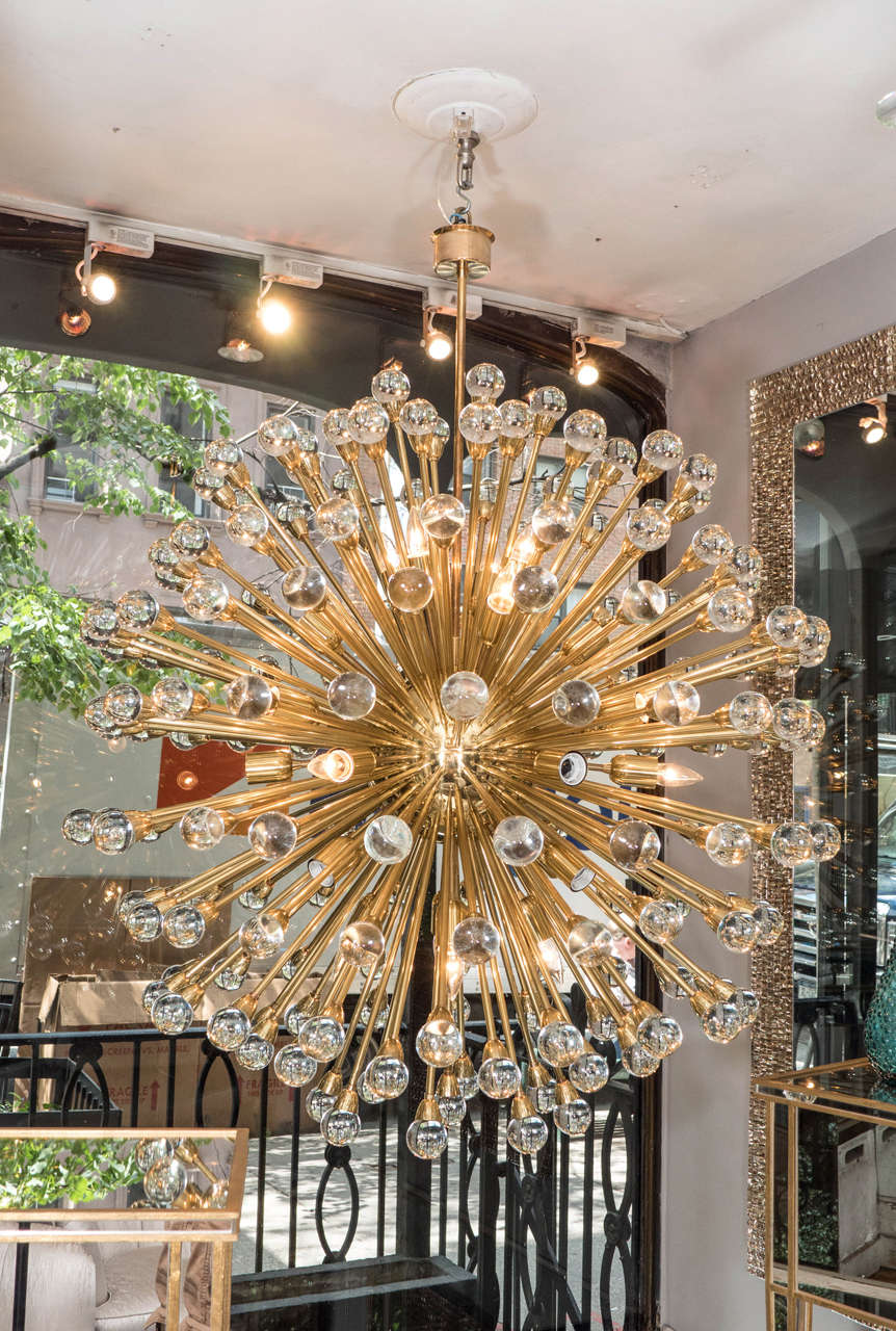 Custom Murano glass ball sputnik chandelier in polished brass finish. There are 15 candelabra light base sockets can take up to 60W/each. Customization is available in different sizes, and finishes. Please specify the overall height (measurement
