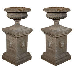 Pair of Stone Garden Urns on Plinths
