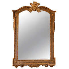A Carved Gilt Wood and Gesso Pier Mirror