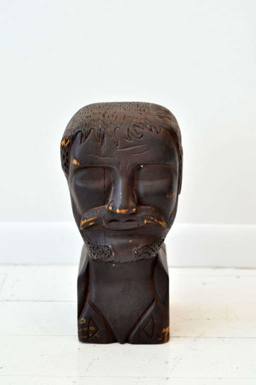 Hand carved sculptural head from pieced together wood